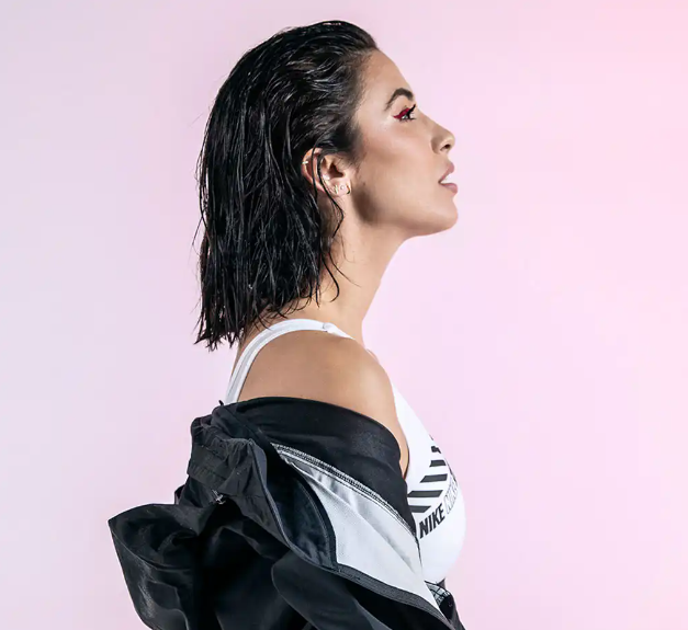 Sleek wet-look hairstyle in profile